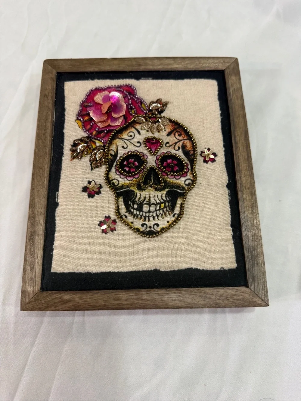 Embellished Sugar Skull Art with Pink Floral Accent